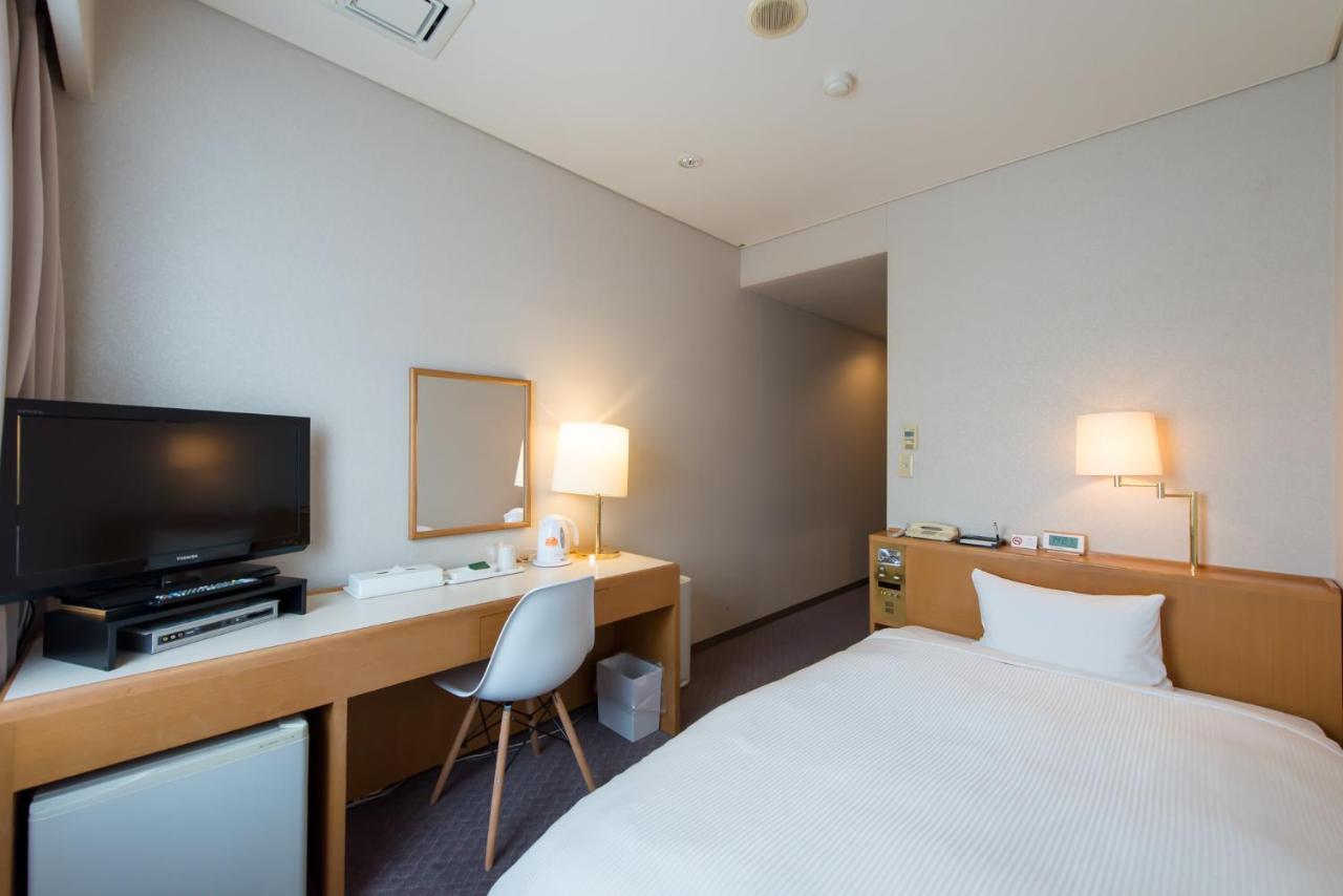 Hotel Ikkeikaku Kesennuma Buitenkant foto