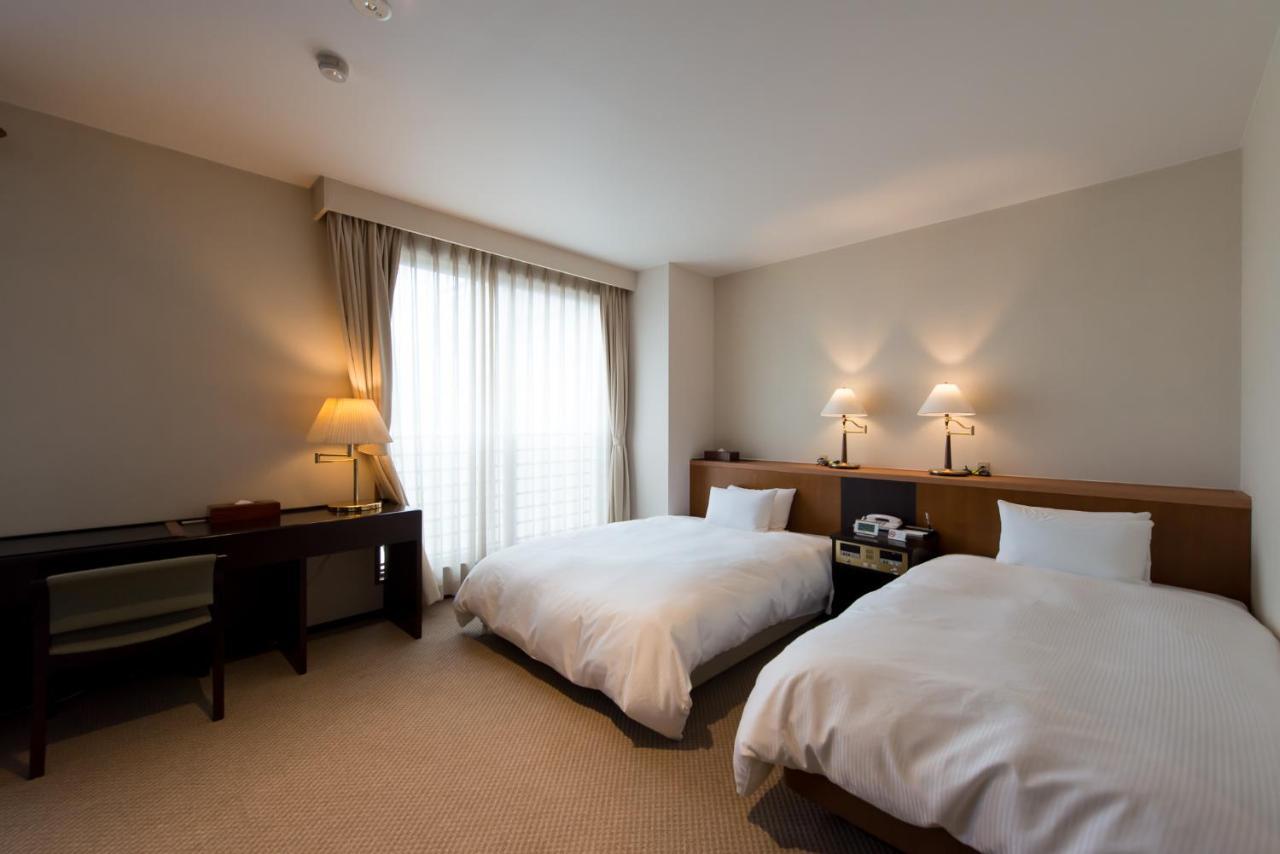 Hotel Ikkeikaku Kesennuma Buitenkant foto