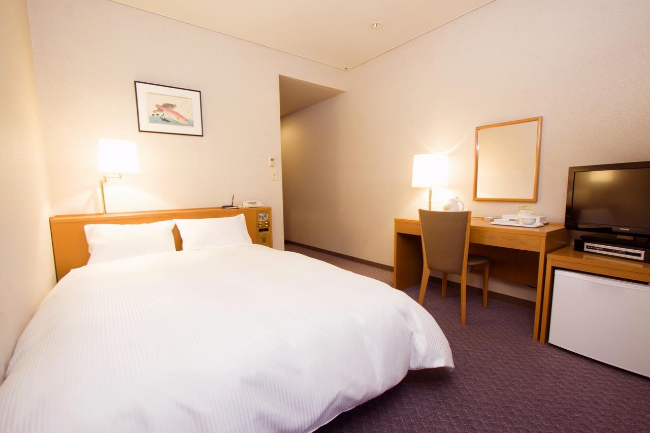 Hotel Ikkeikaku Kesennuma Buitenkant foto