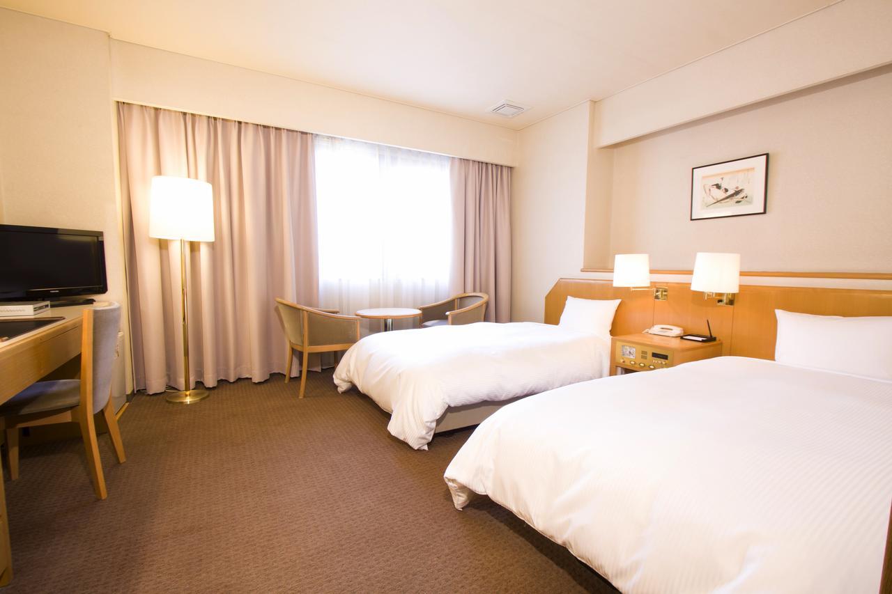 Hotel Ikkeikaku Kesennuma Buitenkant foto